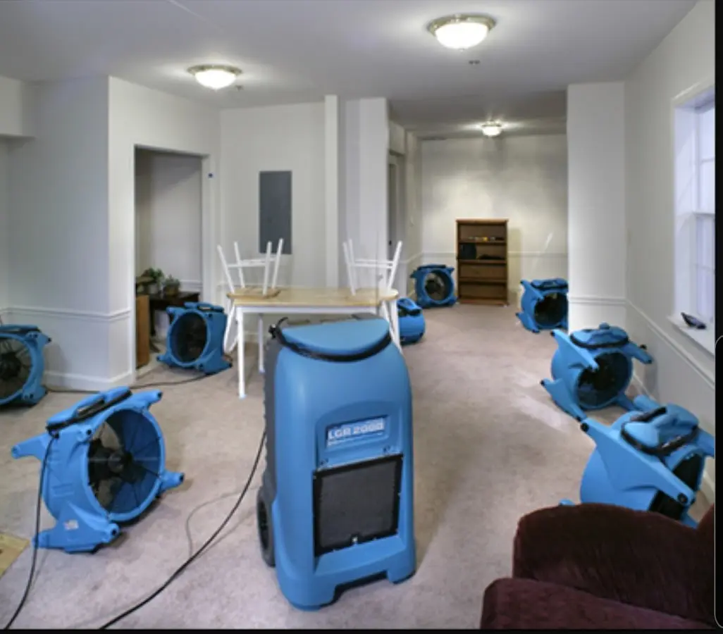 Air movers and dehumidifier setup for Water Damage Restoration in East Alton